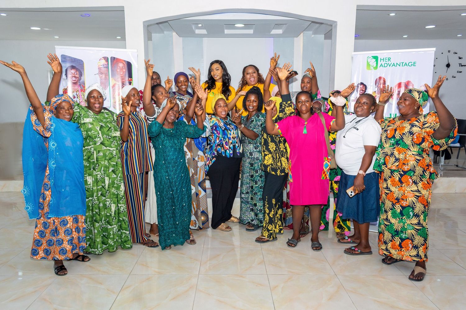 Cooperative members celebrating at the ceremony