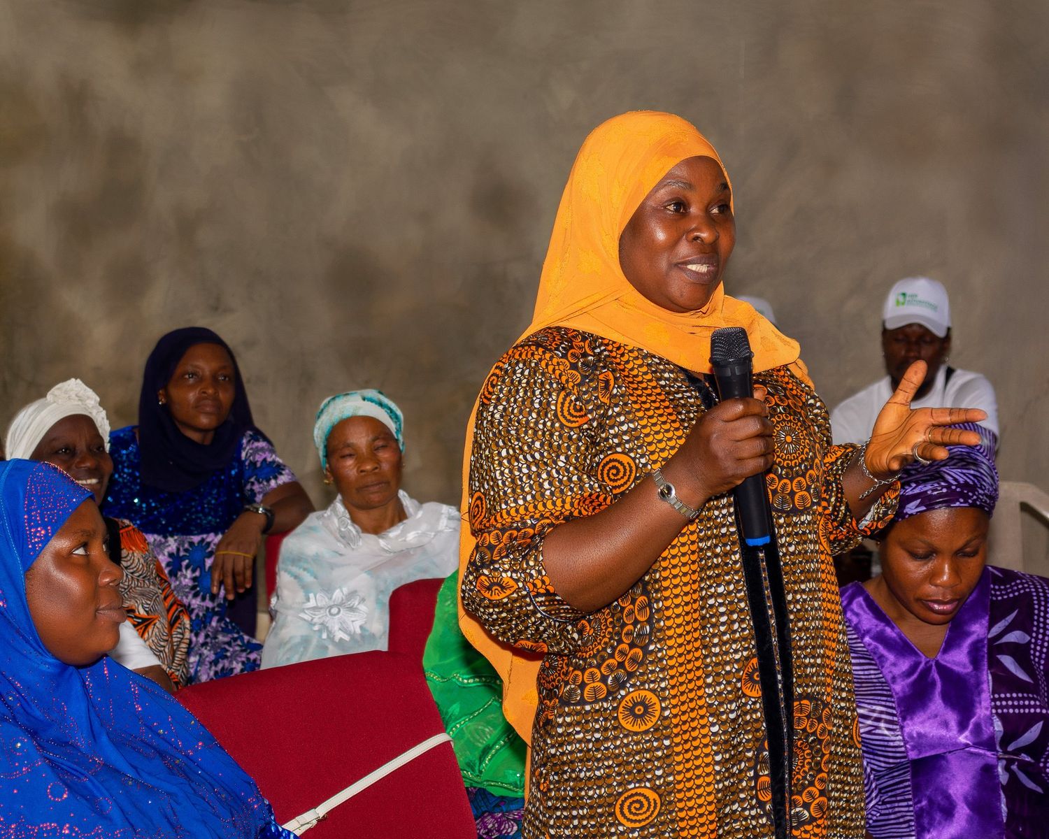 Participants taking notes during training